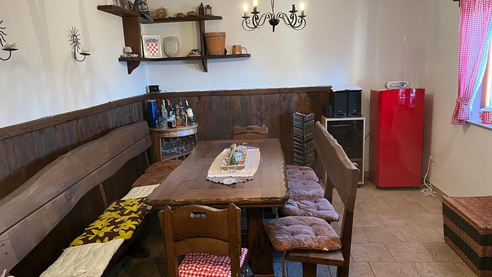 Long wooden dining table with benches