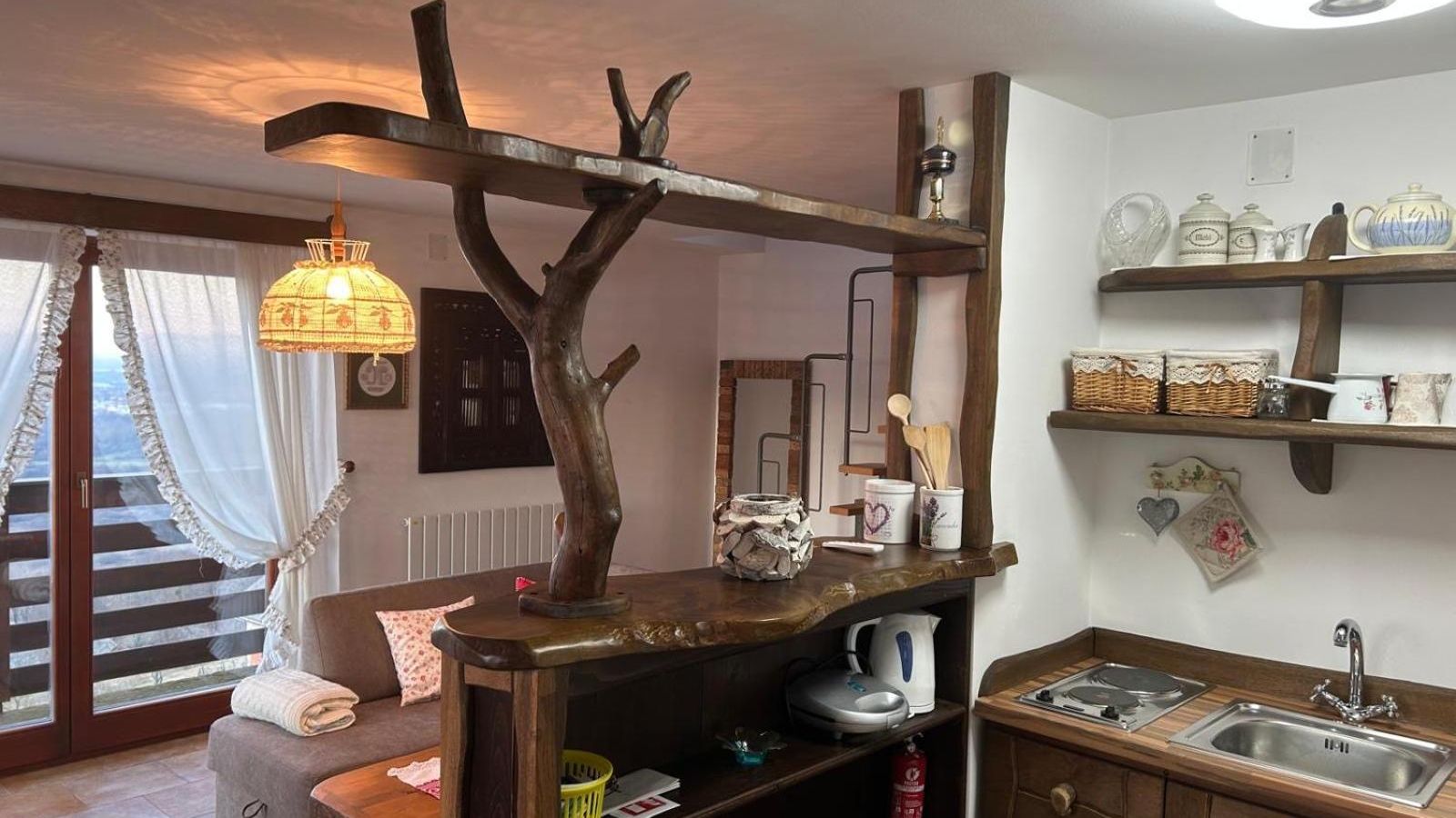 Kitchenette with a counter made from a tree branch